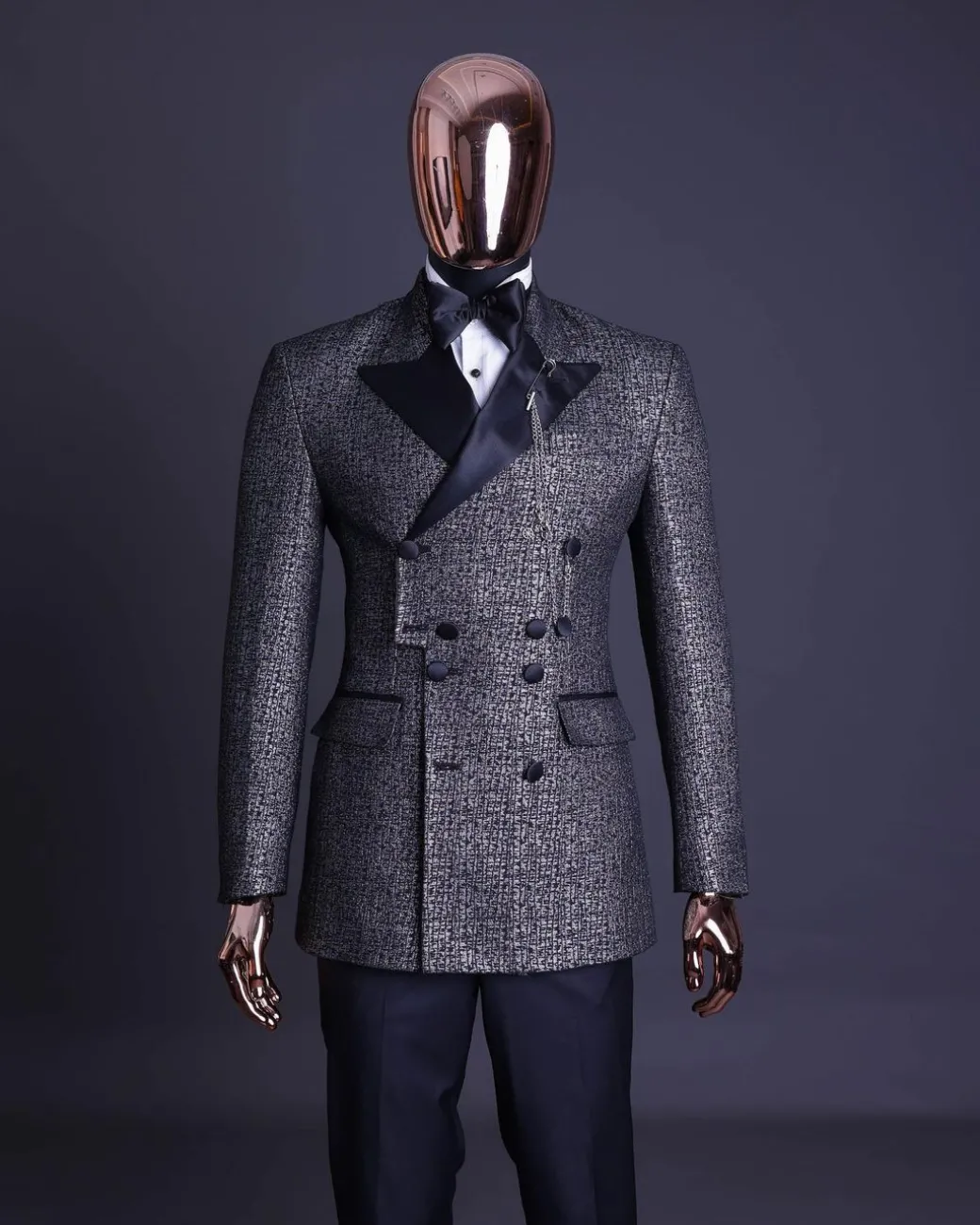 A “pirate” metallic jacquard, layered double breasted, 10 buttons, peak lapel tuxedo suit
