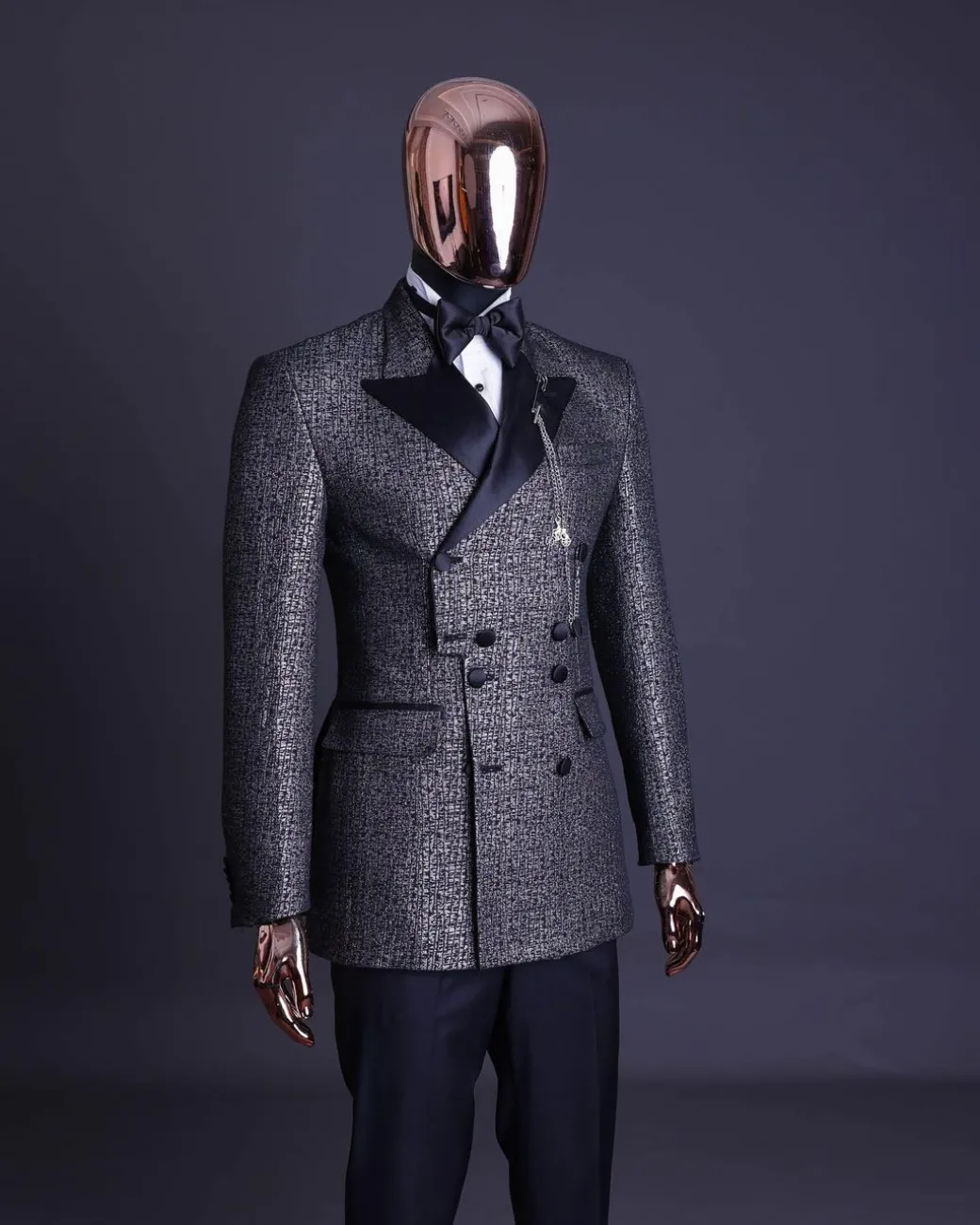 A “pirate” metallic jacquard, layered double breasted, 10 buttons, peak lapel tuxedo suit