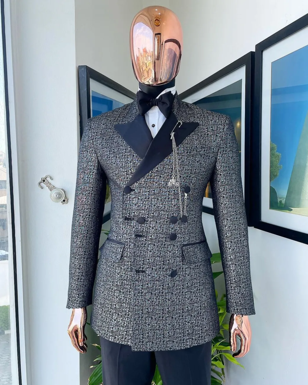 A “pirate” metallic jacquard, layered double breasted, 10 buttons, peak lapel tuxedo suit