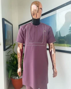 A plum purple double rectangle with ruffles and Swarovski buttons detailing African traditional senator Kaftan native.