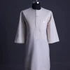 A Porcelain, front flap with gold Swarovski button, patch pocket, 3/4 sleeve African senator kaftan native.