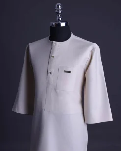 A Porcelain, front flap with gold Swarovski button, patch pocket, 3/4 sleeve African senator kaftan native.