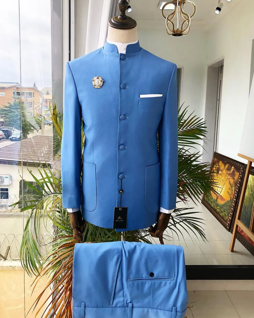 A Powdered Blue “clergyman” French safari Suit