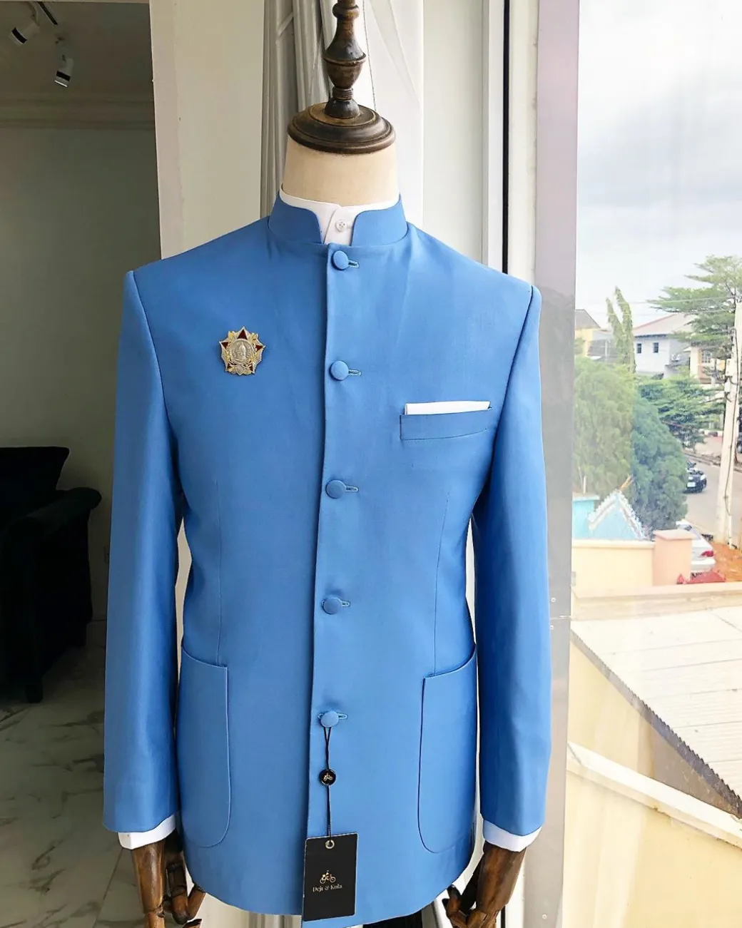 A Powdered Blue “clergyman” French safari Suit