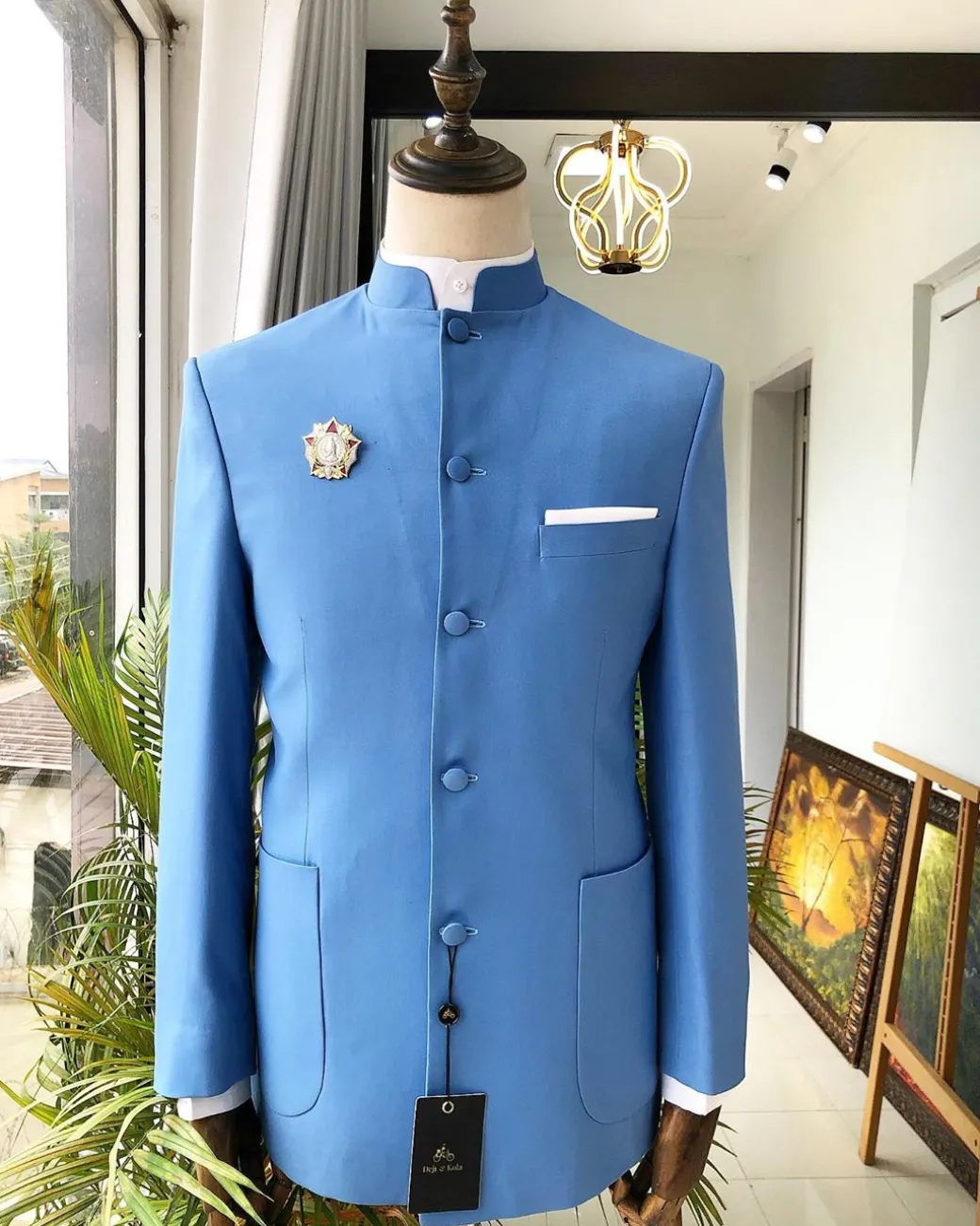 A Powdered Blue “clergyman” French safari Suit