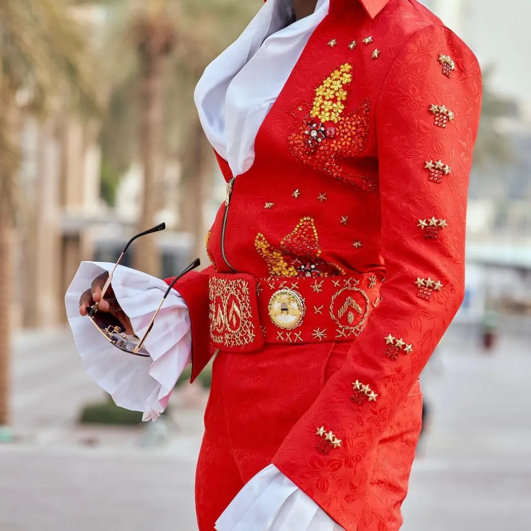 A “Presley (16 – 08 – 1977) ” red Jacquard with metallic wire and Swarovski buttons embroidery costume top