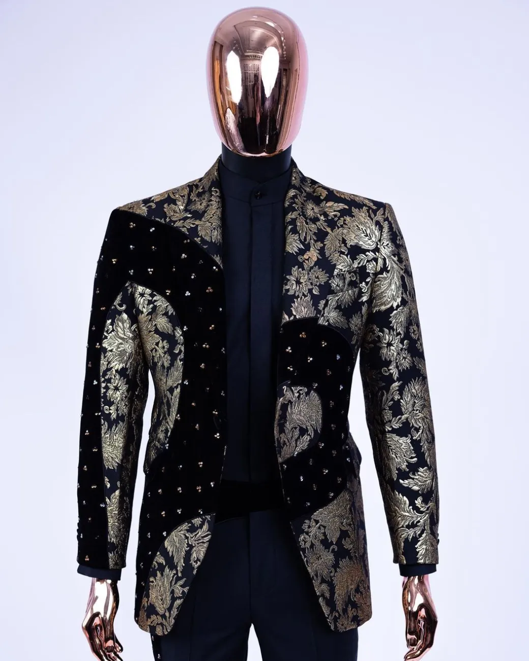 A “Prodigal” dispersed Black and splashed champagne gold suit, Layered black velvet with ss20 mixed Swarovski