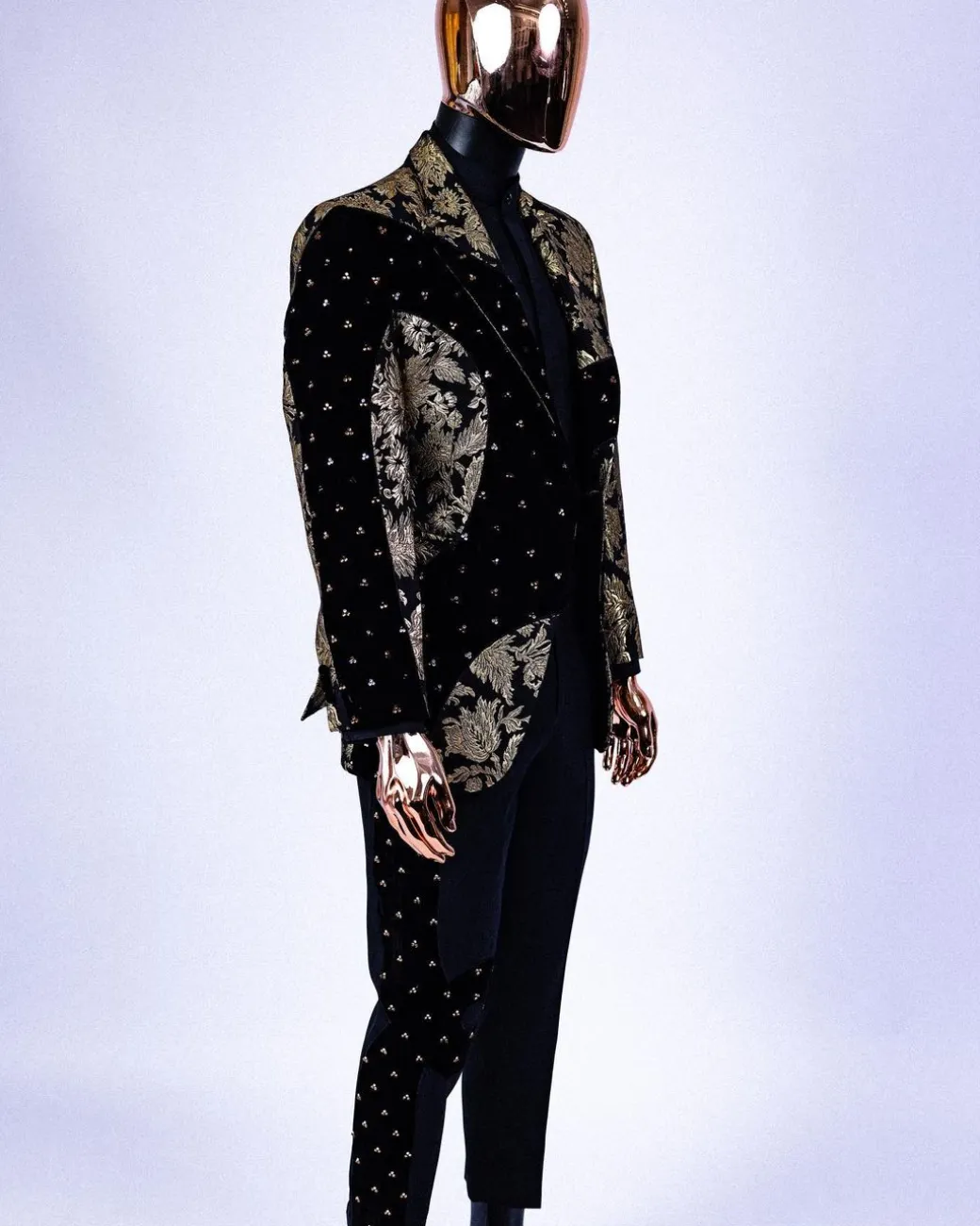 A “Prodigal” dispersed Black and splashed champagne gold suit, Layered black velvet with ss20 mixed Swarovski