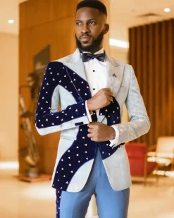 A “Prodigal” dispersed blue and splashed champagne gold metallic jacquard suit
