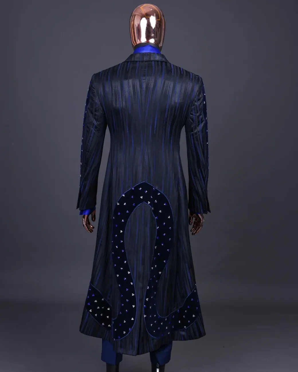 A “Prodigal” lashed midnight blue, admiral blue and splashed black metallic jacquard trench suit