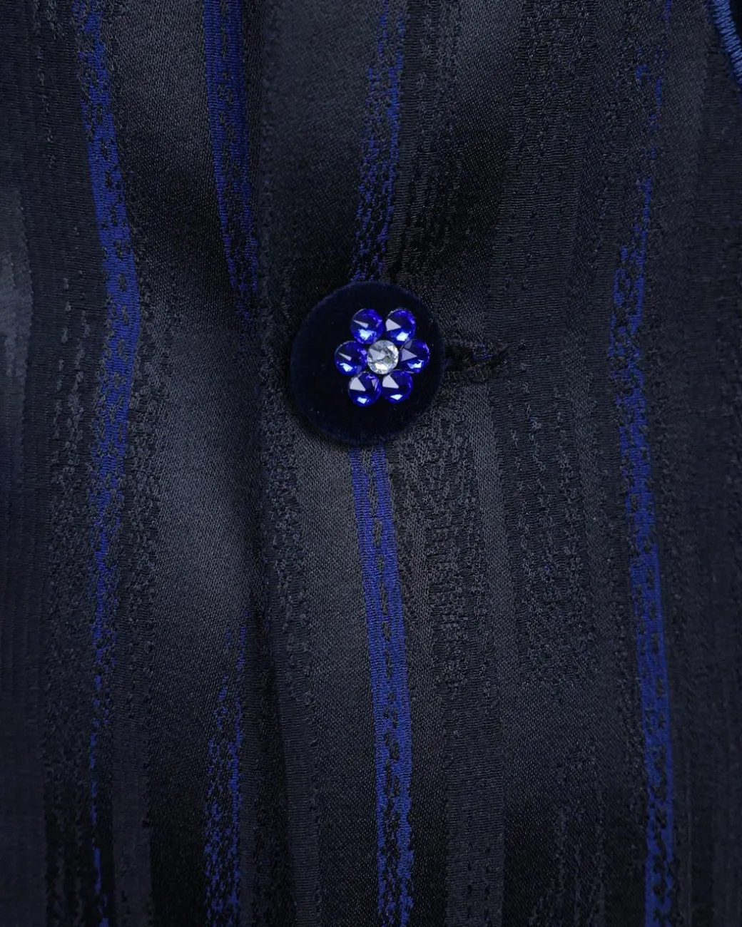 A “Prodigal” lashed midnight blue, admiral blue and splashed black metallic jacquard trench suit