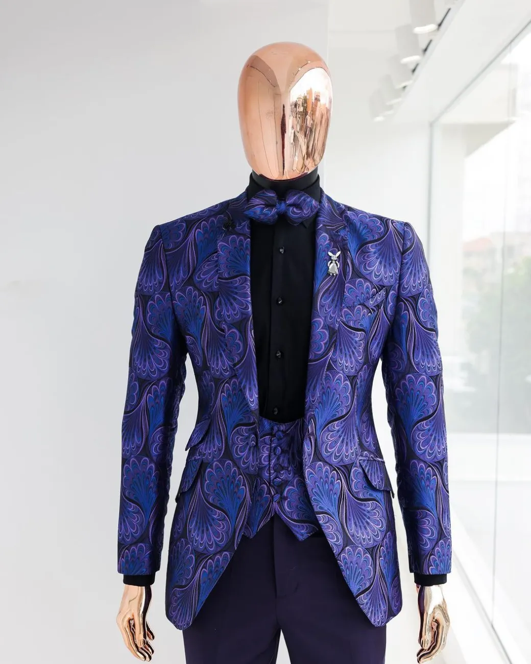A Purple, black & slash of blue petal pattern, notch lapel suit