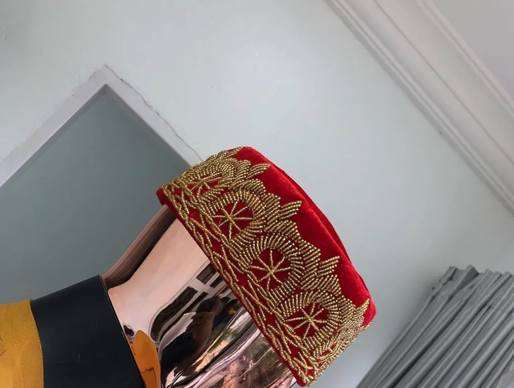 A Red and gold embroidery African traditional hat