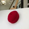 A Red Wool African Ibo Traditional Hat