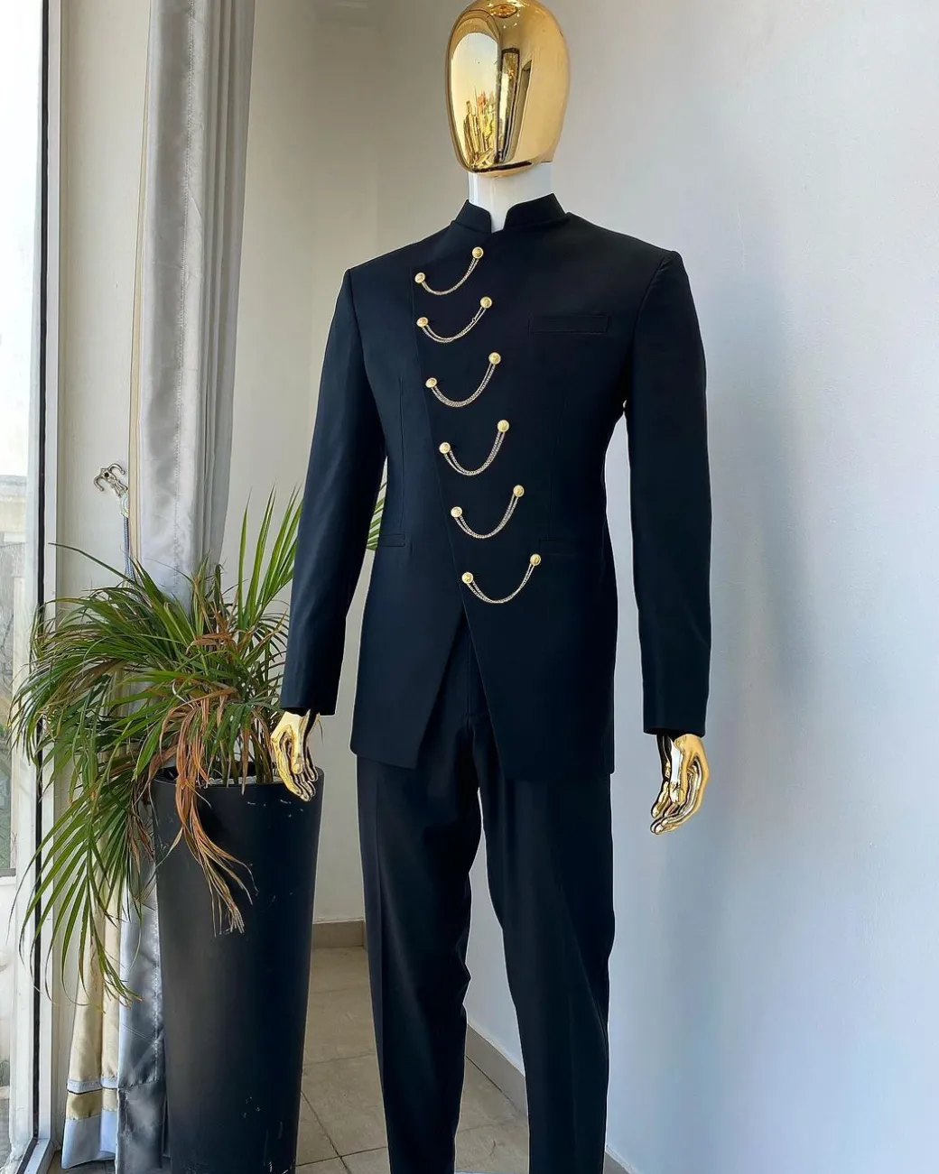 A Reloaded Charcoal black slant front with interconnected gold chain “French” safari suit