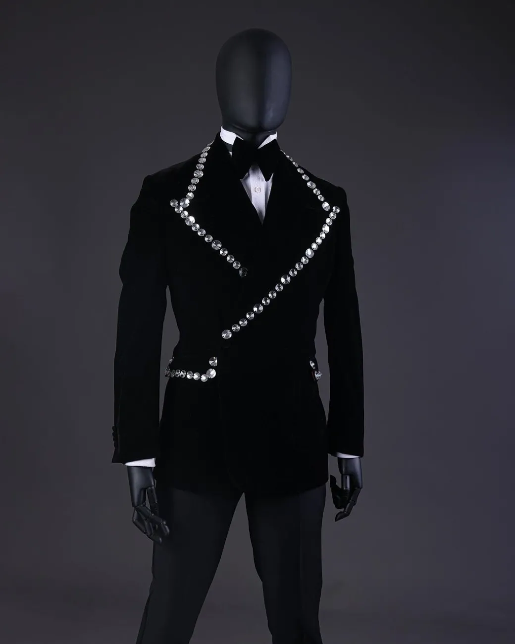 A Reloaded “Herd” Charcoal Black Soaked Velvet Peak Lapel Wrap Tuxedo Suit
