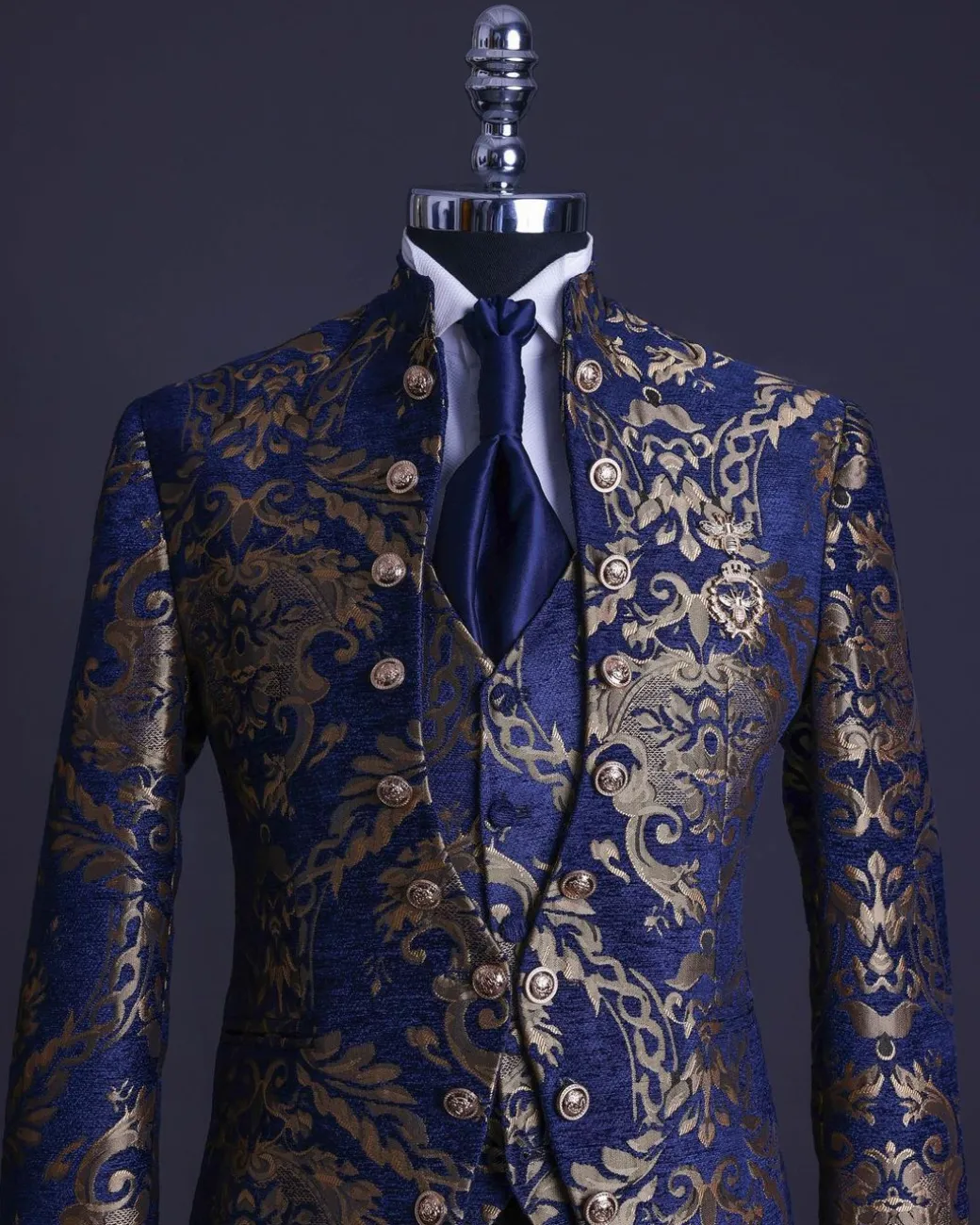 A reloaded “Monaco” gold and blue “Mandarin” jacquard floral single button front cut layered suit