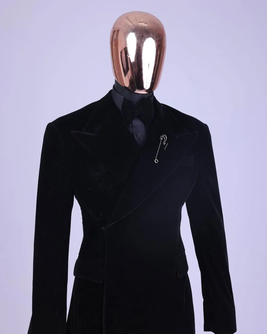 A reloaded monochrome “herd” charcoal black soaked velvet peak lapel wrap tuxedo suit