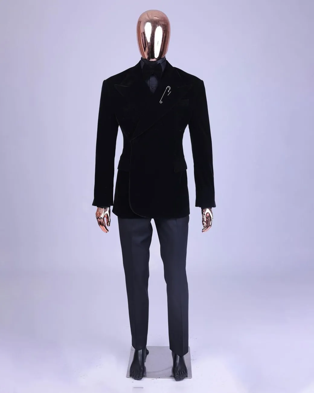 A reloaded monochrome “herd” charcoal black soaked velvet peak lapel wrap tuxedo suit