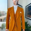 A reloaded monochrome “peaky blinders” hand knitted soaked Italian velvet ochre yellow peak lapel suit