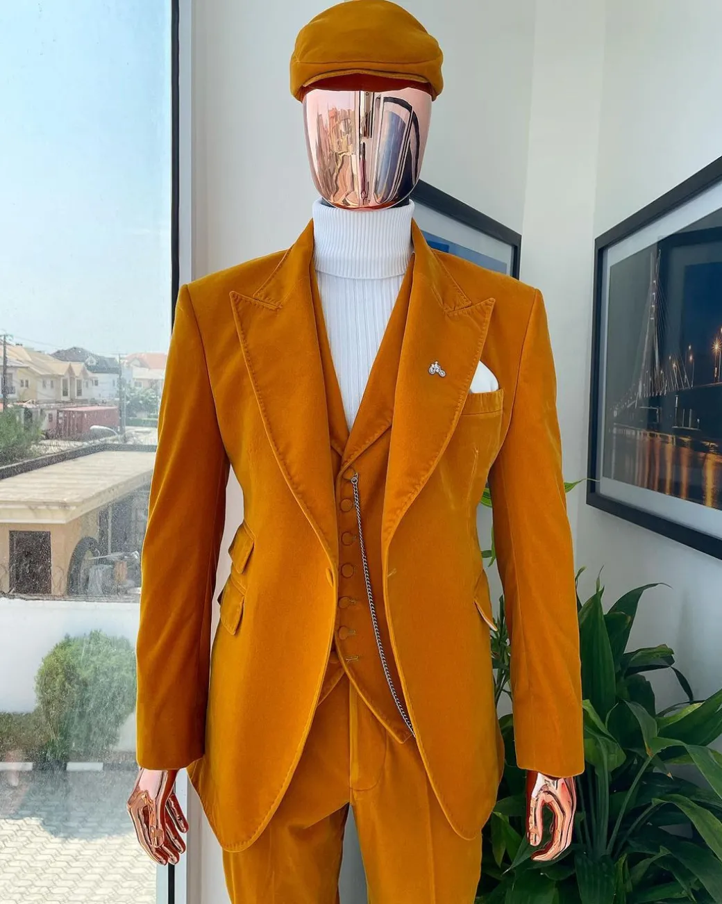 A reloaded monochrome “peaky blinders” hand knitted soaked Italian velvet ochre yellow peak lapel suit