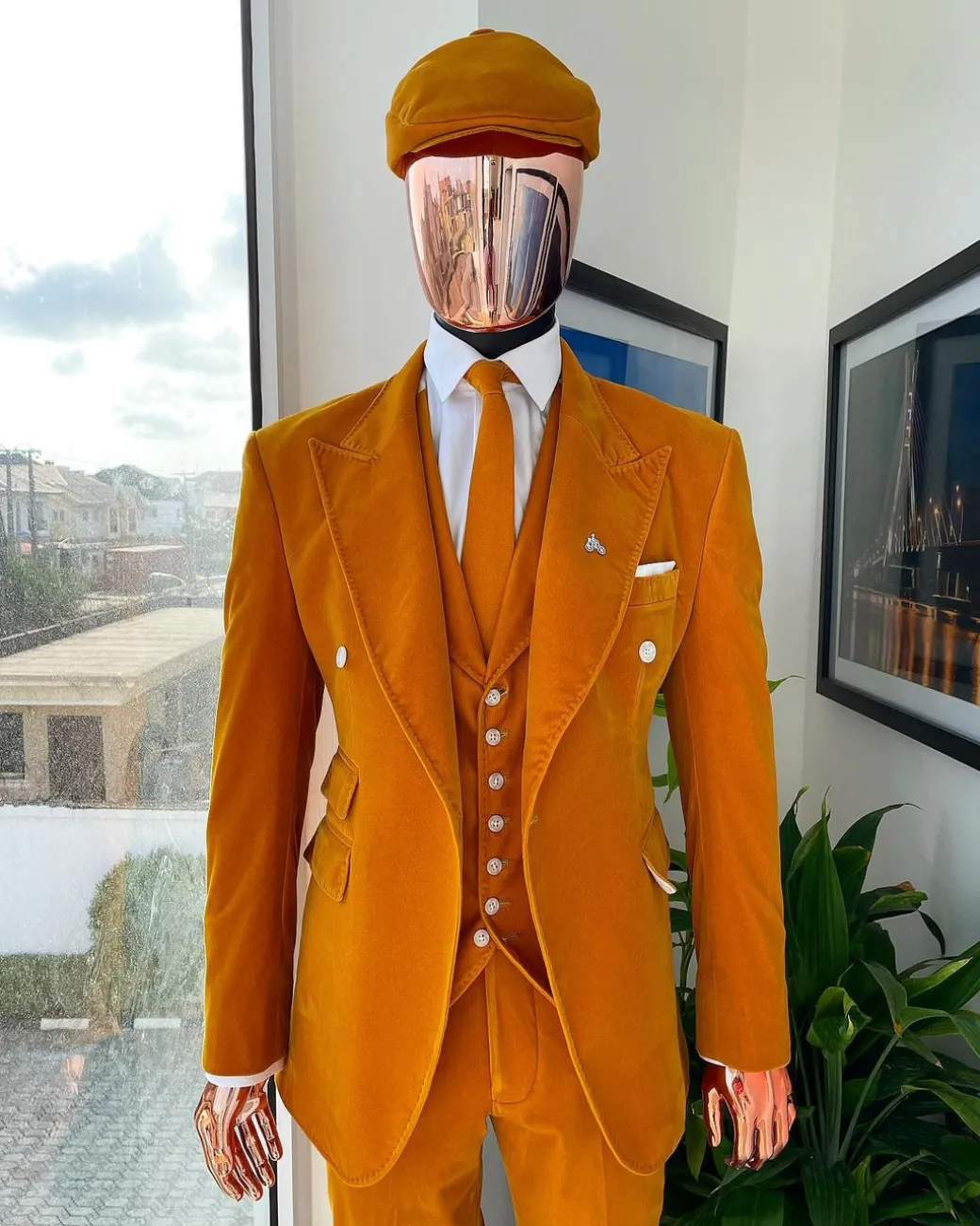 A reloaded monochrome “peaky blinders” hand knitted soaked Italian velvet ochre yellow peak lapel suit