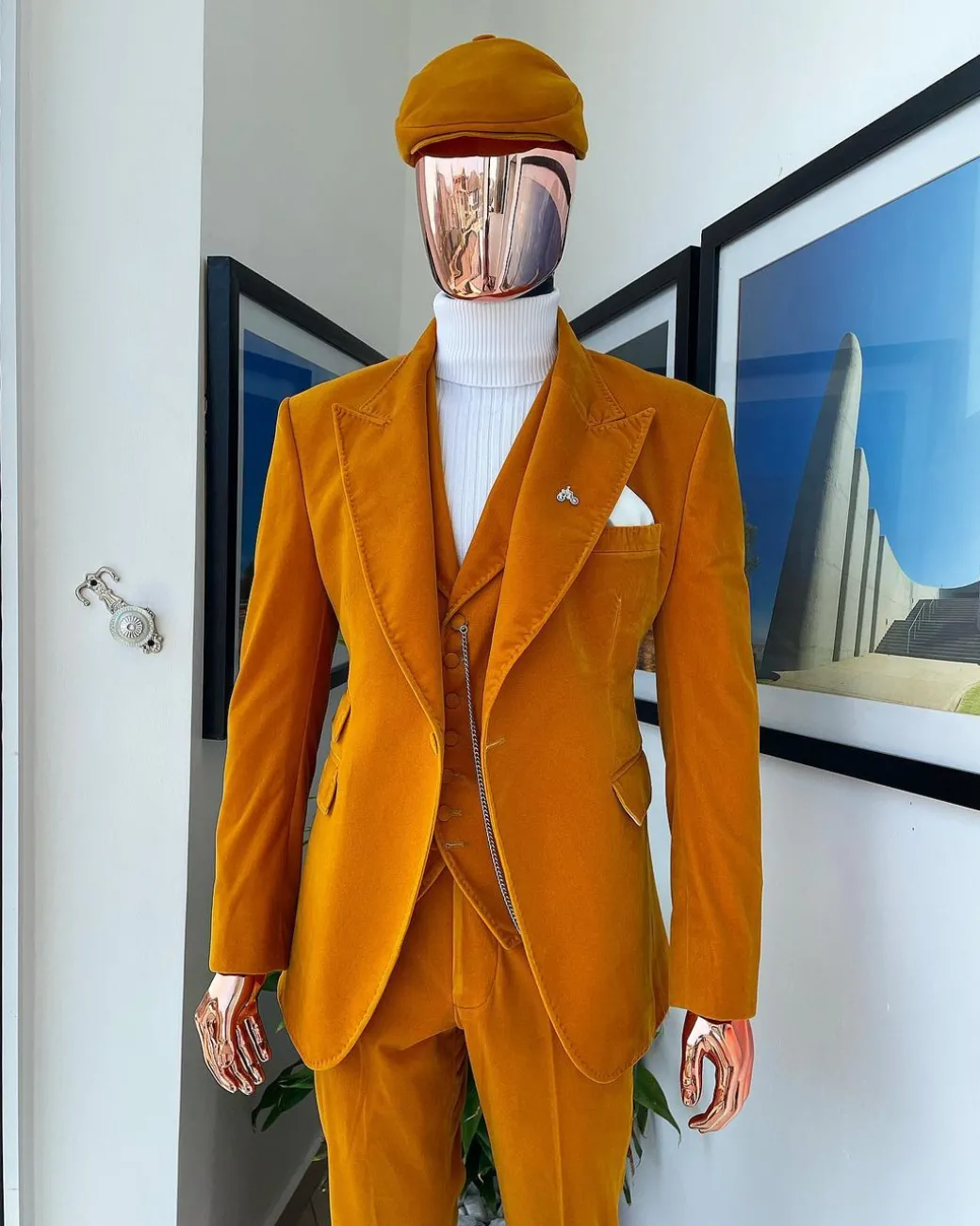 A reloaded monochrome “peaky blinders” hand knitted soaked Italian velvet ochre yellow peak lapel suit