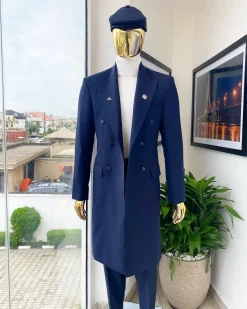 A reloaded “peaky Blinder” midnight blue peak lapel trench suit