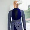 A Reloaded “pirate”, spotted navy blue and orange metallic jacquard, shawl lapel tuxedo suit