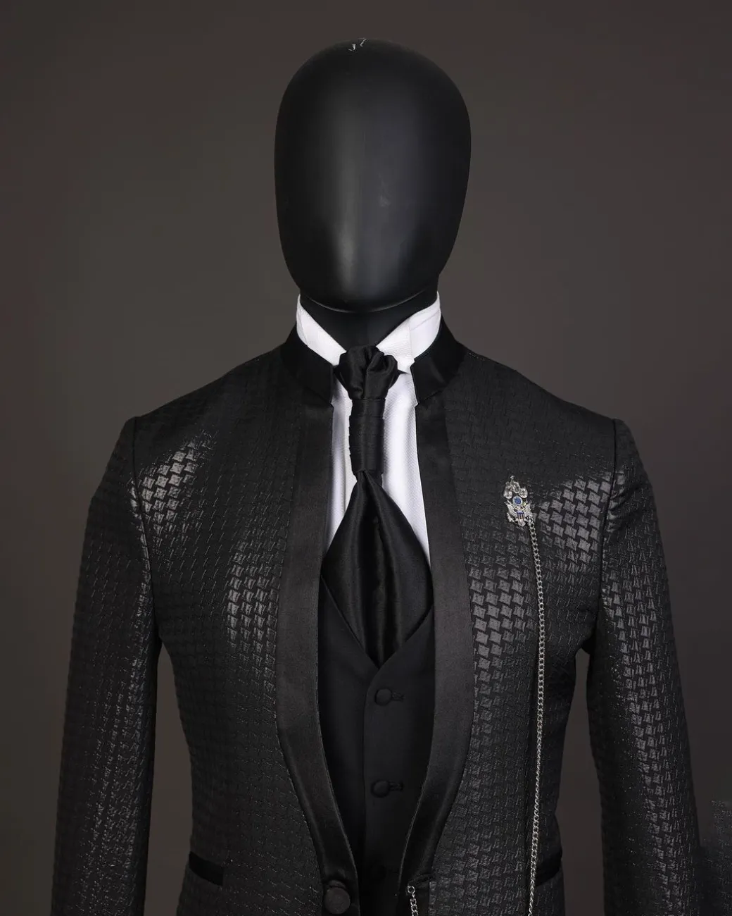 A Reloaded “Pope” monochrome black inverted square patterned metallic jacquard tuxedo suit