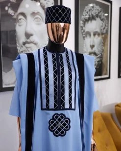 A Reloaded sky blue Monochrome embroidery with navy blue soaked Italian velvet detailing agbada