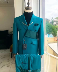 A reloaded Teal Green Tuxedo Double breasted strap “Oranmiyan” Suit