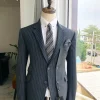A Revolutionary “Catch Me If You Can” Grey Bold Pencil Stripe notch lapel double side-breasted Suit.