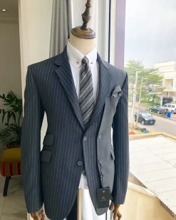 A Revolutionary “Catch Me If You Can” Grey Bold Pencil Stripe notch lapel double side-breasted Suit.