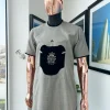 A Rhino grey, beaded hand embroidery front patch with black velvet pattern detailing African traditional senator kaftan native.