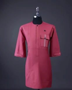 A Rogue pink, Front flap with black Swarovski button, 3/4 sleeve with combat patch pocket details African senator kaftan native.