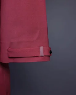 A Rogue pink, Front flap with black Swarovski button, 3/4 sleeve with combat patch pocket details African senator kaftan native.