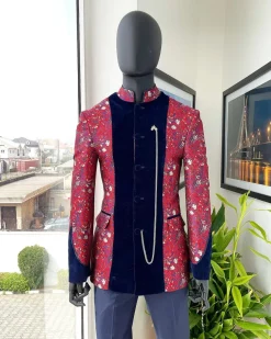 A Royal Navy blue, white and red splashed Mandarin Jacquard safari tuxedo royal suit