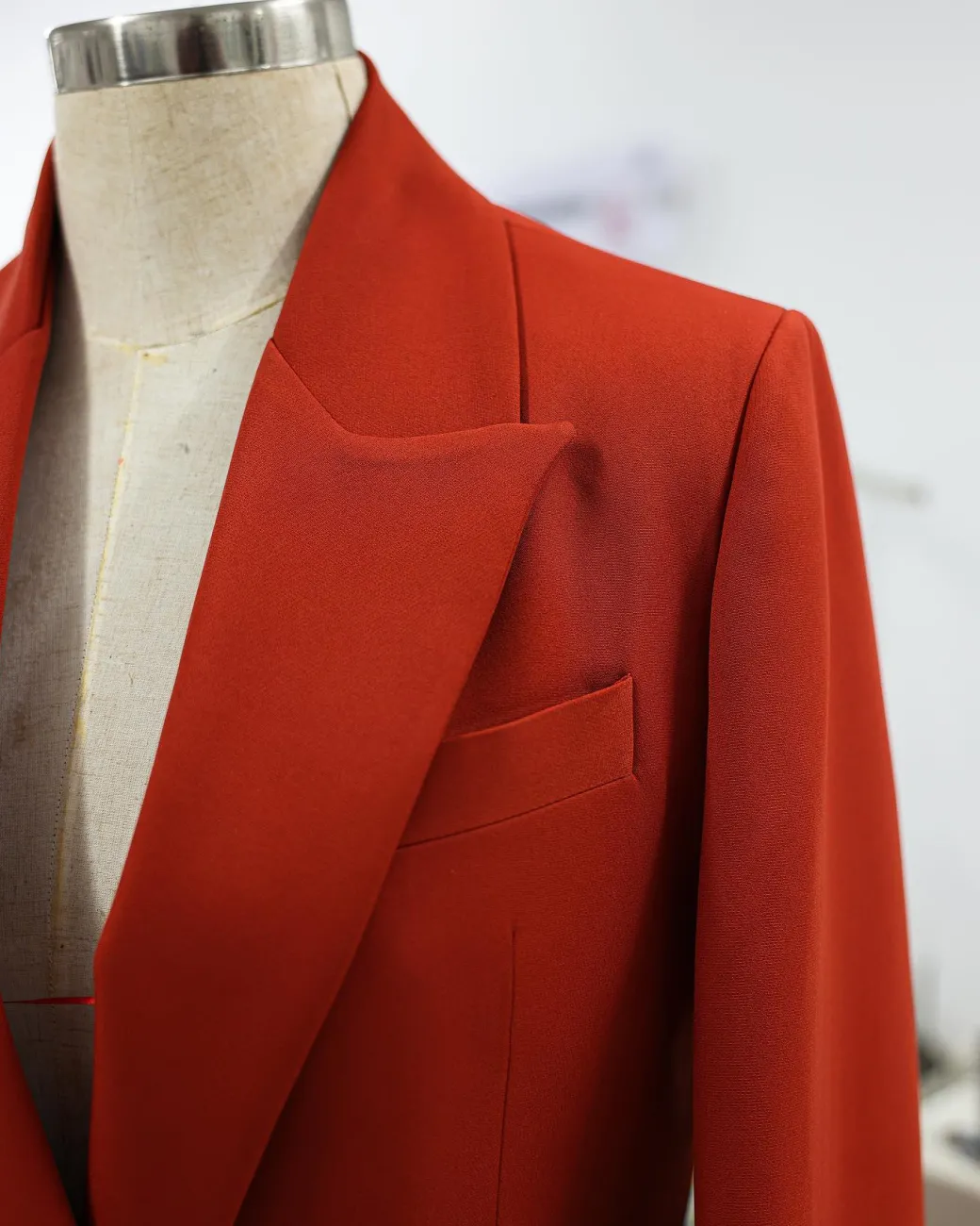 A Rust Orange Peak Lapel, Double-Breasted Jacket.