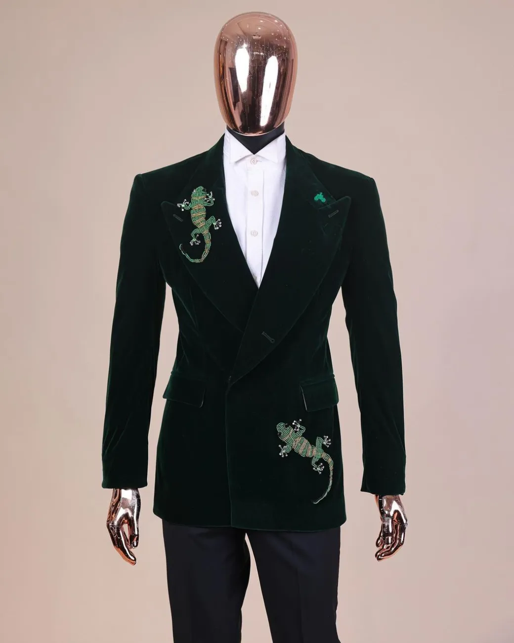 A Sacramento green “agama” soaked velvet peak lapel single button double breasted suit