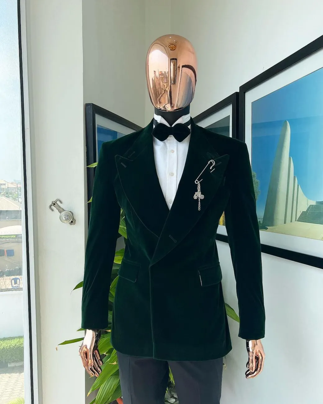 A Sacramento green “agama” soaked velvet peak lapel single button double breasted suit with lizard patch