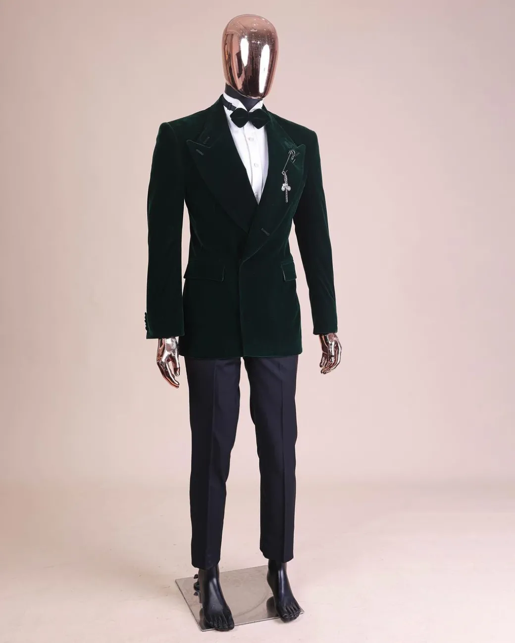 A Sacramento green “agama” soaked velvet peak lapel single button double breasted suit with lizard patch