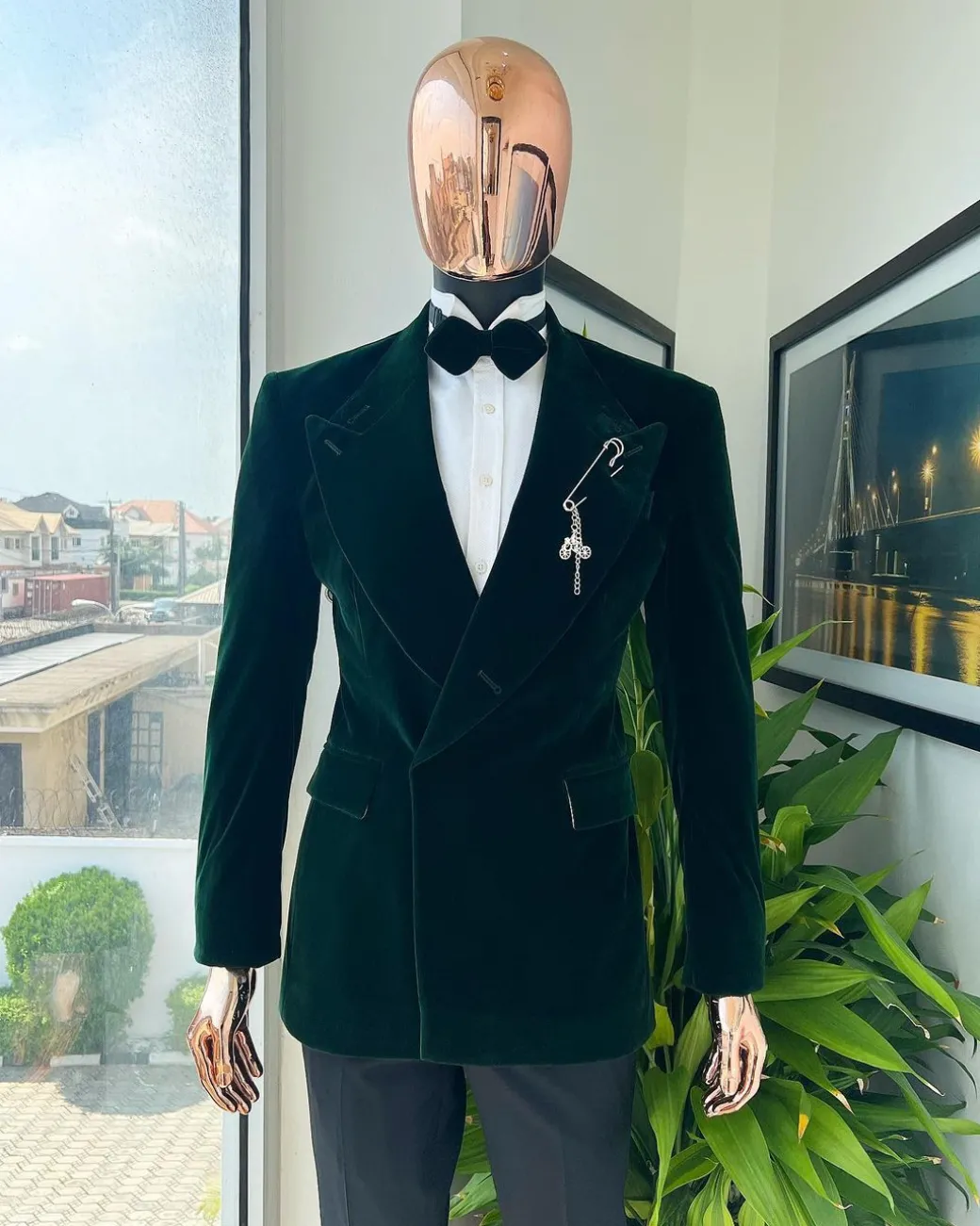 A Sacramento green “agama” soaked velvet peak lapel single button double breasted suit with lizard patch