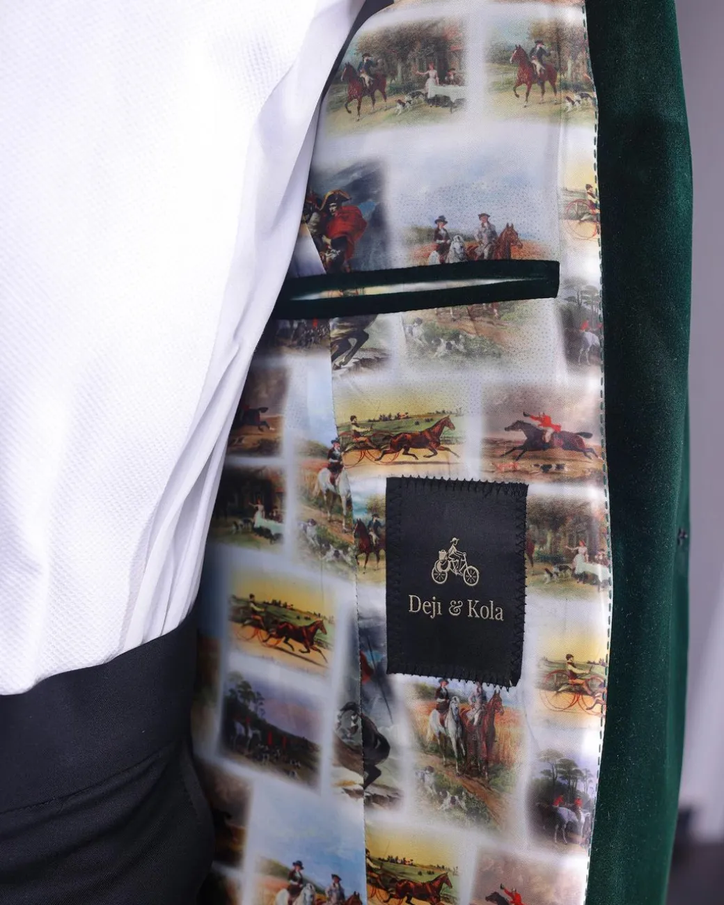 A Sacramento green “agama” soaked velvet peak lapel single button double breasted suit with lizard patch