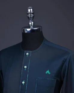 A Sacramento green, Front flap with green Swarovski buttons, patch pocket, 3/4 sleeve details African senator kaftan native.