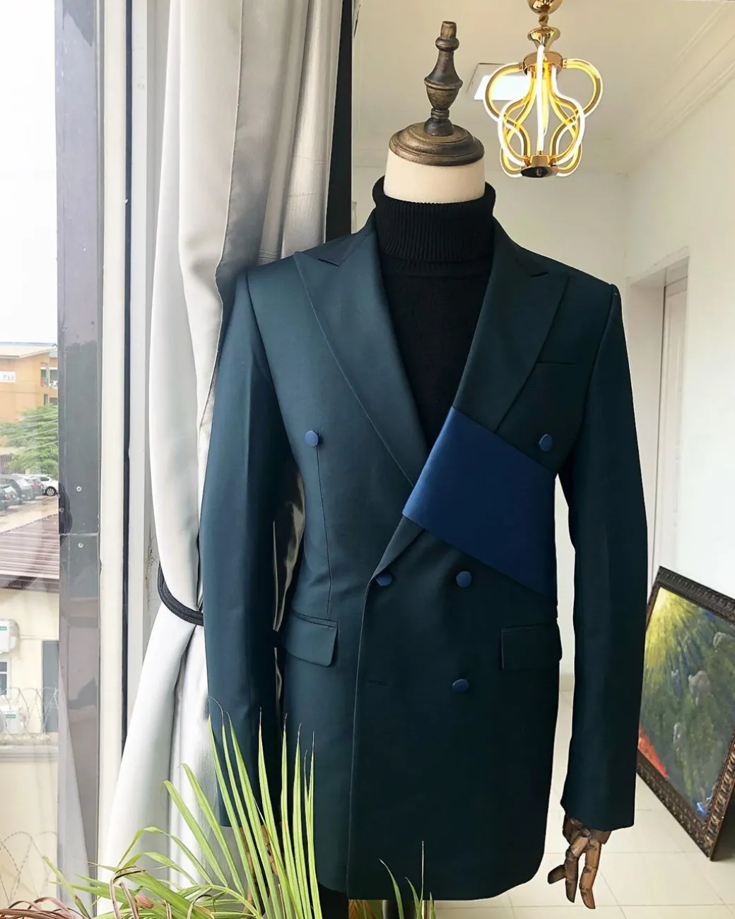 A Sacramento Green “Oranmiyan“ Double Breasted Peak Lapel Suit