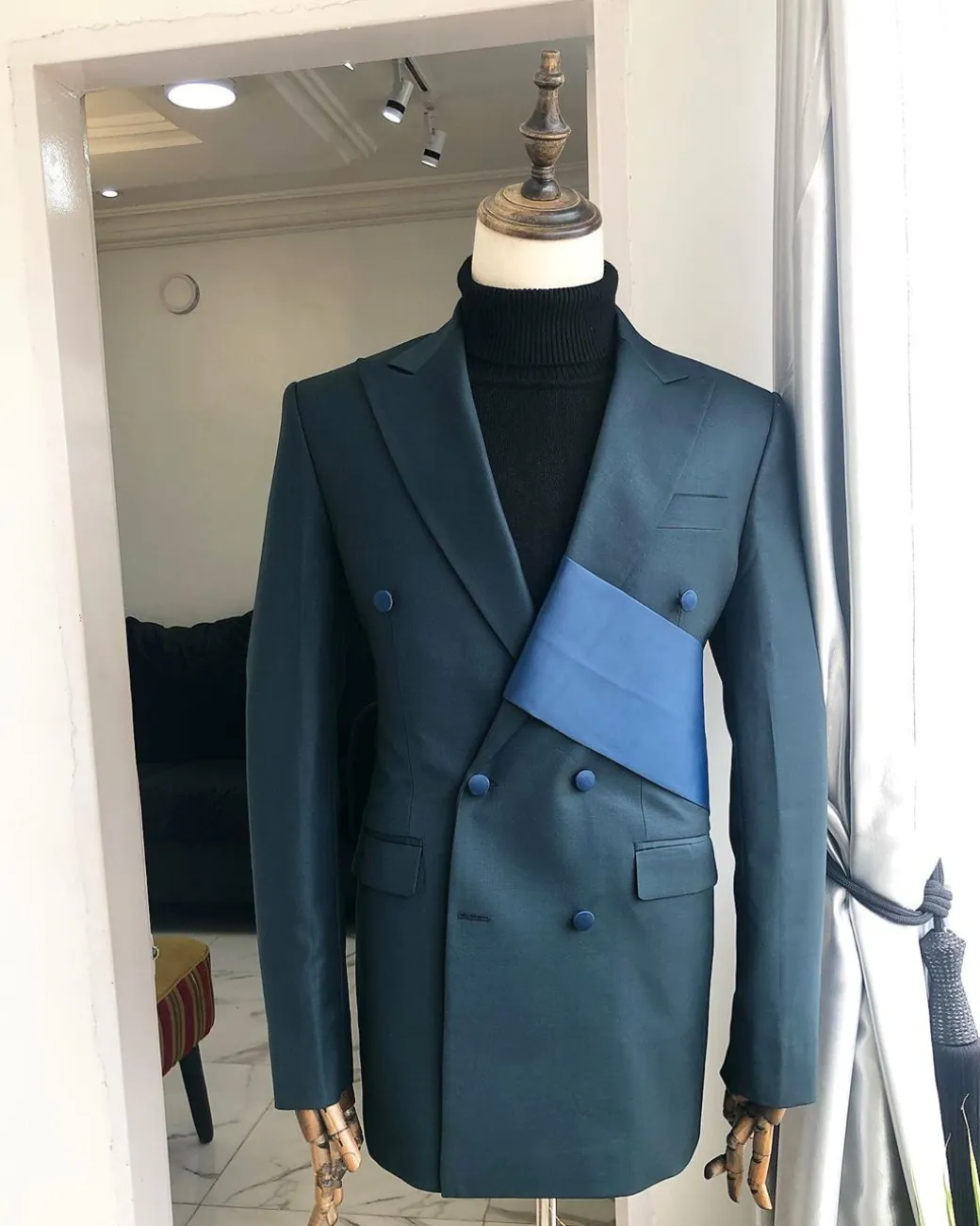 A Sacramento Green “Oranmiyan“ Double Breasted Peak Lapel Suit