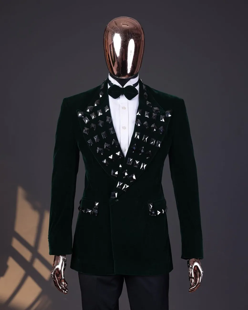 A Sacramento green soaked velvet peak lapel single button double breasted suit