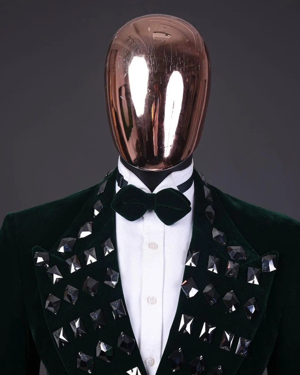 A Sacramento green soaked velvet peak lapel single button double breasted suit