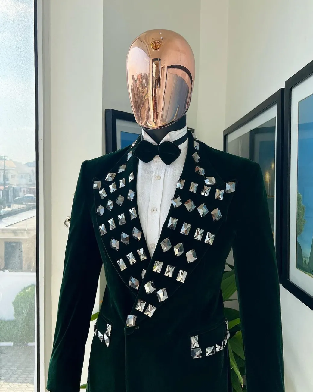 A Sacramento green soaked velvet peak lapel single button double breasted suit